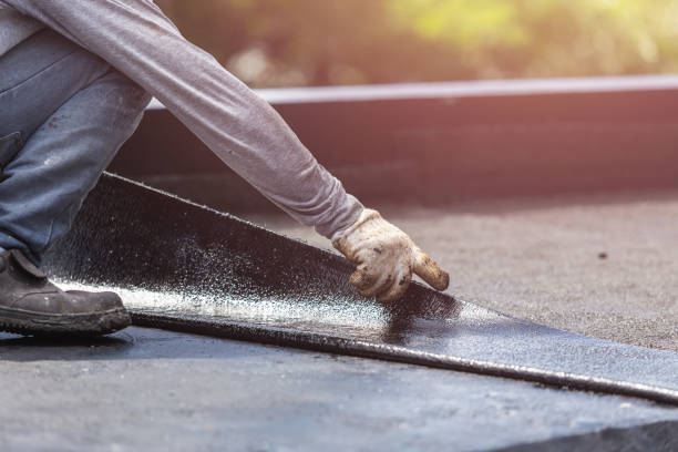 Professional Waterproofing technician working in Sidney, MI
